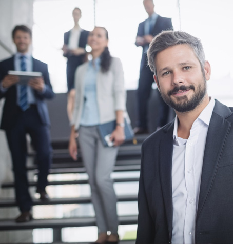 Confident business professionals symbolizing TalentIQ Ireland’s strategic approach to executive search, HR advisory, and leadership consulting excellence.