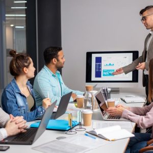 Team of HR and business consultants collaborating in a meeting, representing TalentIQ Ireland’s commitment to precision hiring and long-term organizational value.